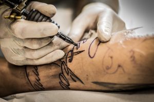 Tatuaggio-braccio-scritta
